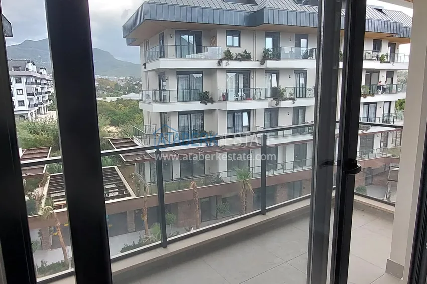 Приобрести Квартира в Оба с видом на горы в новом комплексе комфорт-класса 9 