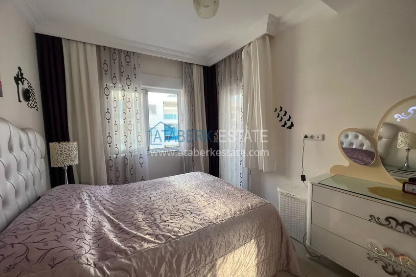 Приобрести Предложение напрямую от собственника - уютная двухкомнатная квартира с мебелью в Махмутларе 12