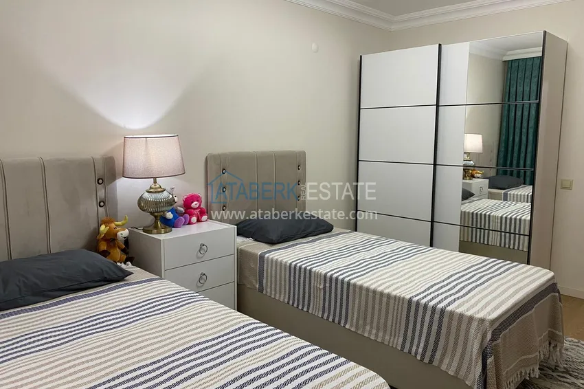 Приобрести Квартира в центре Алании – район пляжа Клеопатра с 3 спальнями и отдельной кухней 12