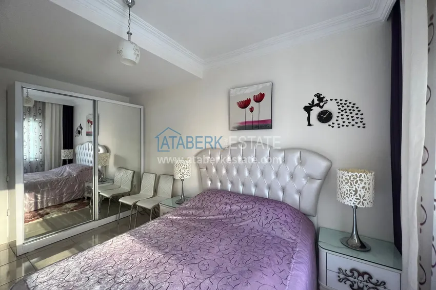 Приобрести Предложение напрямую от собственника - уютная двухкомнатная квартира с мебелью в Махмутларе 13