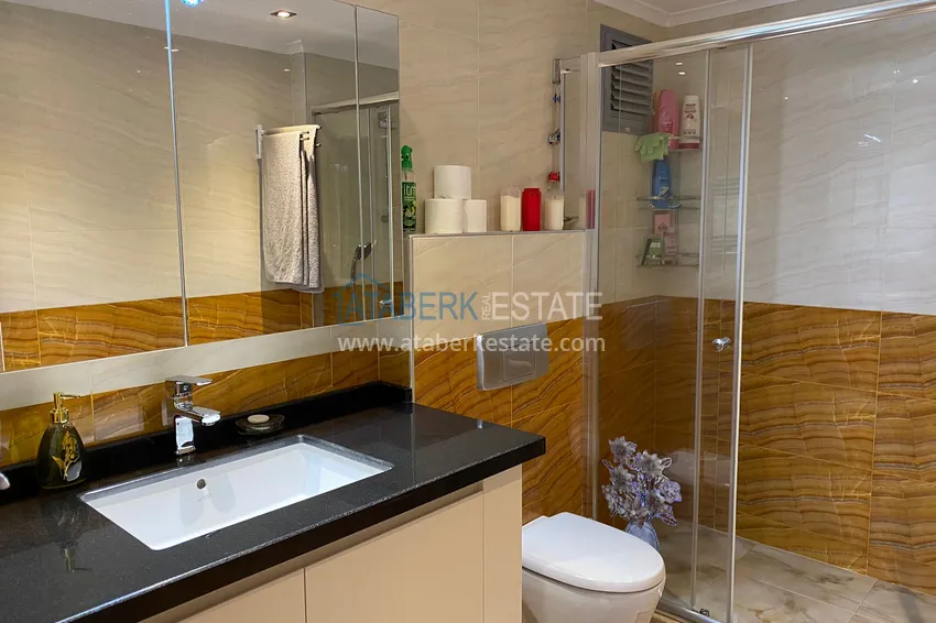 Приобрести Квартира в центре Алании – район пляжа Клеопатра с 3 спальнями и отдельной кухней 14