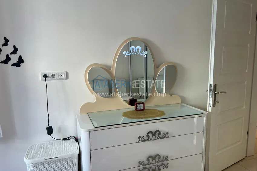 Приобрести Предложение напрямую от собственника - уютная двухкомнатная квартира с мебелью в Махмутларе 16