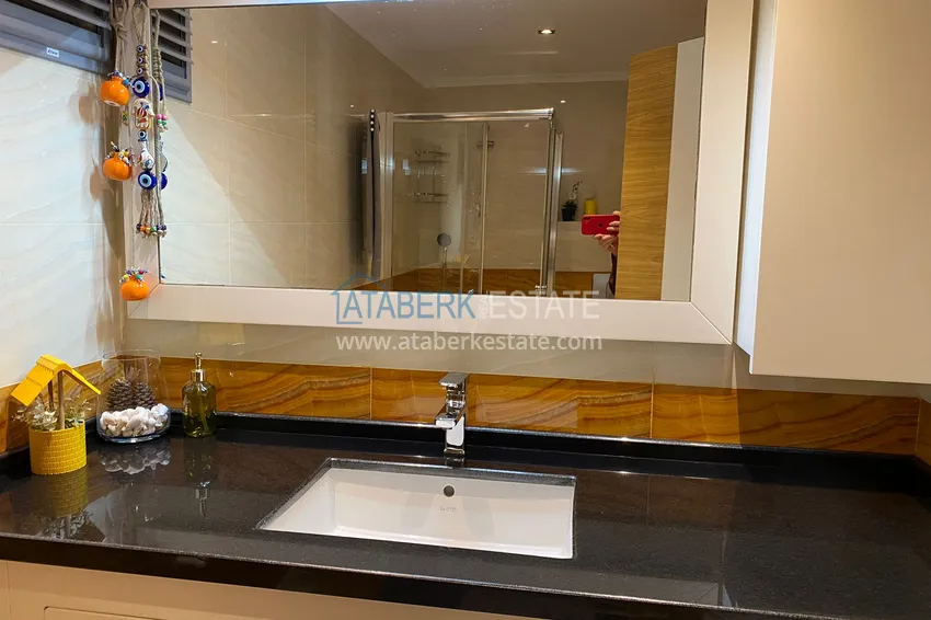 Приобрести Квартира в центре Алании – район пляжа Клеопатра с 3 спальнями и отдельной кухней 15