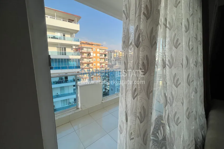 Приобрести Предложение напрямую от собственника - уютная двухкомнатная квартира с мебелью в Махмутларе 17