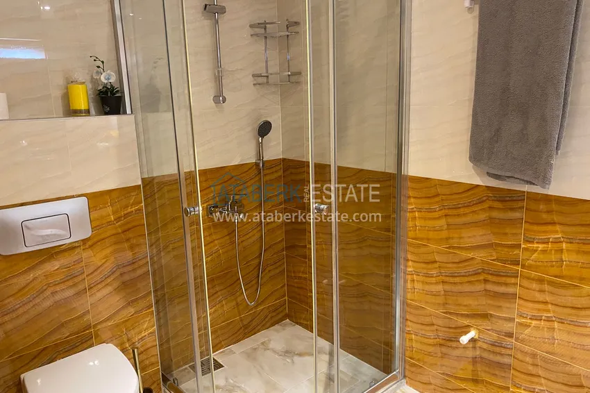 Приобрести Квартира в центре Алании – район пляжа Клеопатра с 3 спальнями и отдельной кухней 16