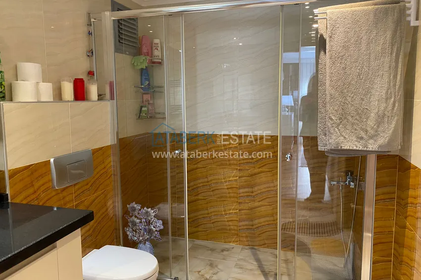 Приобрести Квартира в центре Алании – район пляжа Клеопатра с 3 спальнями и отдельной кухней 17