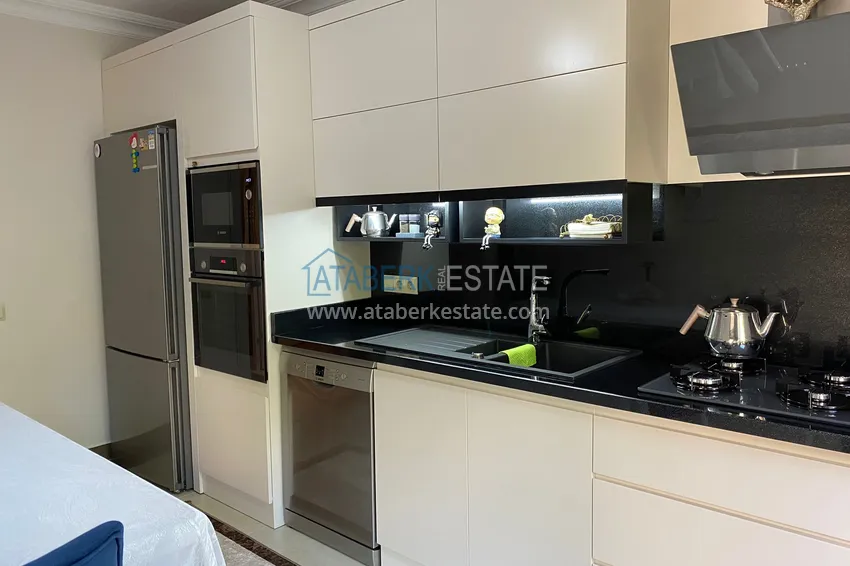 Приобрести Квартира в центре Алании – район пляжа Клеопатра с 3 спальнями и отдельной кухней 6