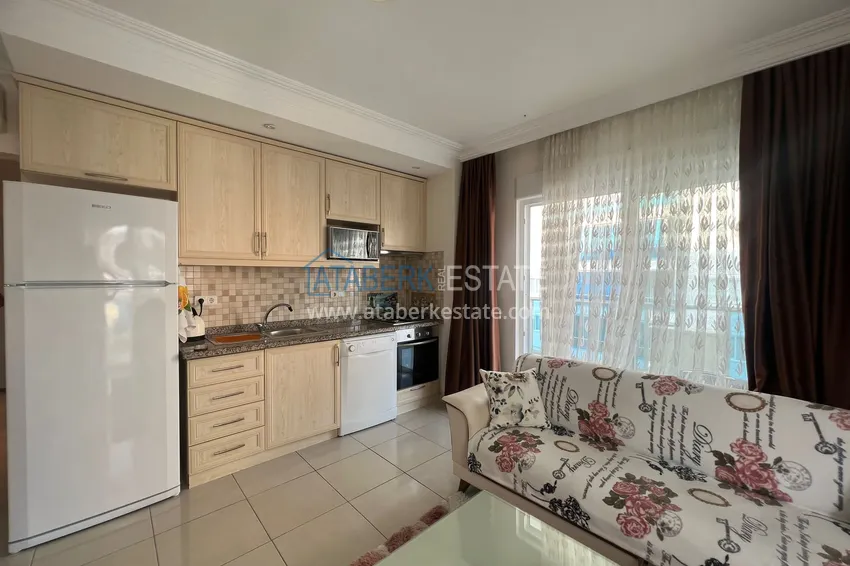 Приобрести Предложение напрямую от собственника - уютная двухкомнатная квартира с мебелью в Махмутларе 11