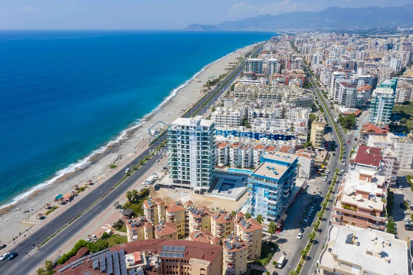Квартира 2+1 с террасой 70 м² в Алании, район Махмутлар - с мебелью и видом на море  1 
