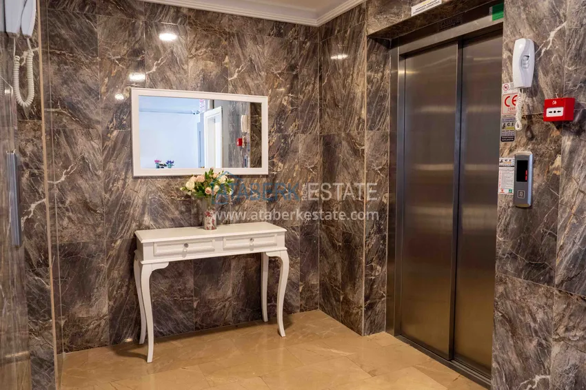 Квартира 2+1 с террасой 70 м² в Алании, район Махмутлар - с мебелью и видом на море  12 