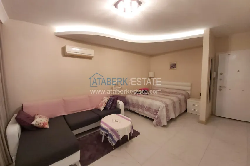 Приобрести Квартира-студия с видом на горы в центре Алании - район пляжа Клеопатра 2 