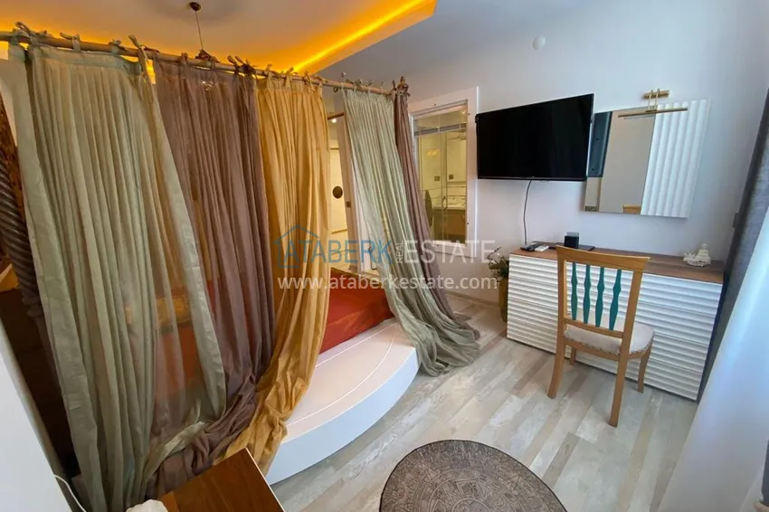 Приобрести Эксклюзивная квартира с индивидуальным дизайнерским интерьером и потрясающим открытым видом на море – Алания, Махмутлар 26 