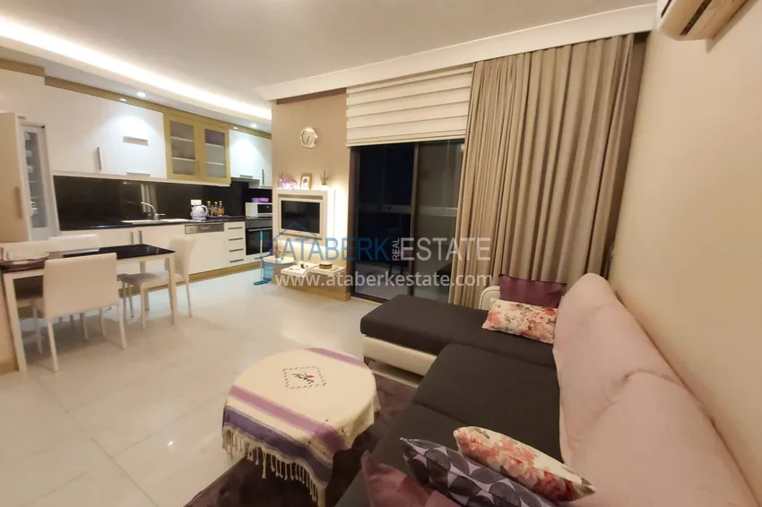 Приобрести Квартира-студия с видом на горы в центре Алании - район пляжа Клеопатра 1 