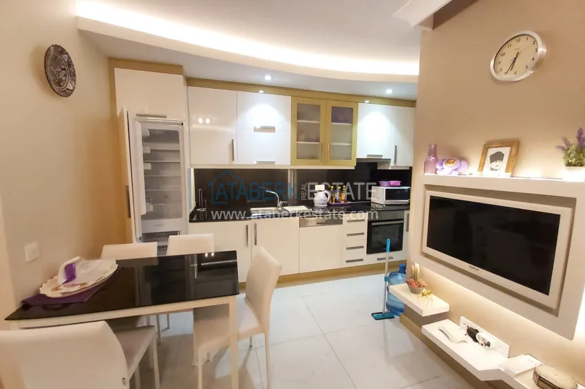 Приобрести Квартира-студия с видом на горы в центре Алании - район пляжа Клеопатра 3 