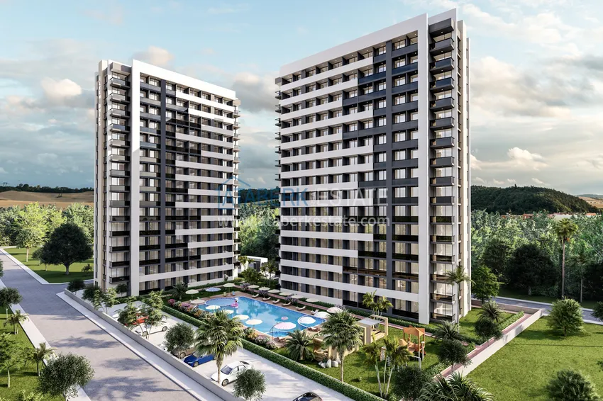 Апартаменты 1+1 в районе Арпачбахшиш в Мерсине 1 