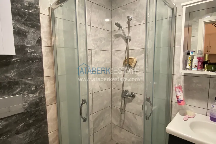 Приобрести Квартира 1+1 в Махмутларе меблированная с видом на горы и море. Мопед в подарок!  12 