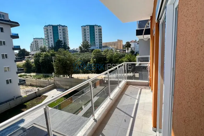 Приобрести Квартира 2+1 в Авсалларе с чистовой отделкой и видом на горы в современном комплексе 12