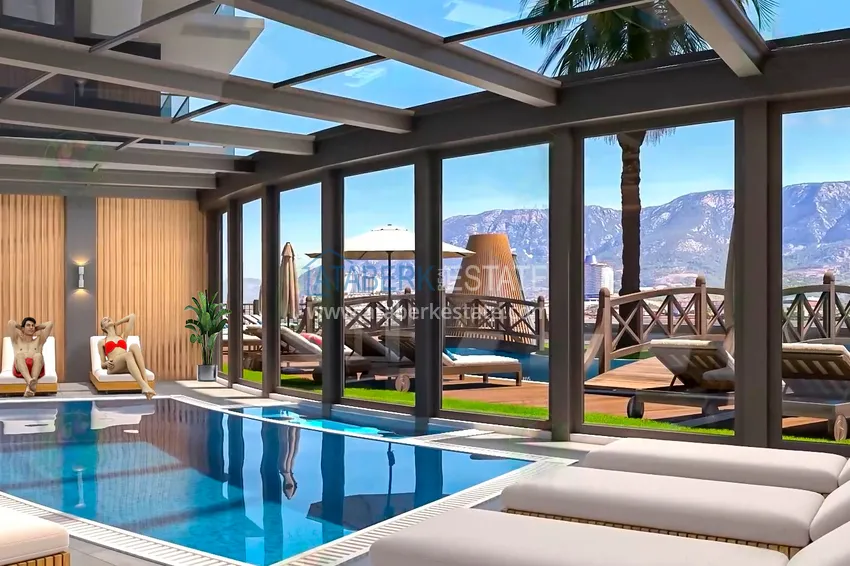 Квартиры в строящейся резиденции элитного сегмента в Алании, район Каргыджак. Подходят для получения гражданства 24 