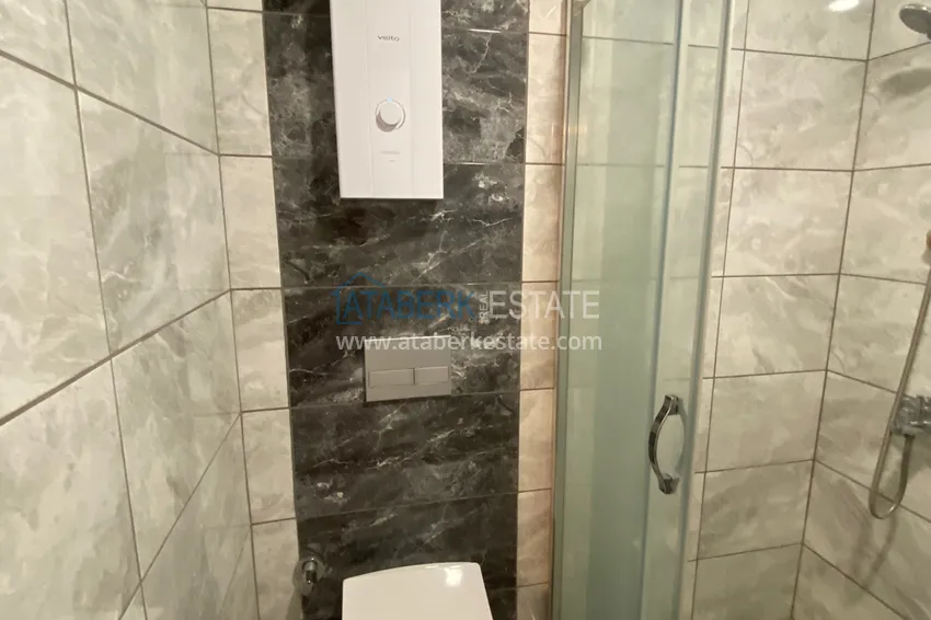 Приобрести Квартира 1+1 в Махмутларе меблированная с видом на горы и море. Мопед в подарок!  13 