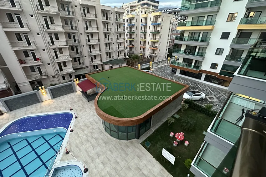 Приобрести Квартира 1+1 меблированная с открытым видом на море, район Махмутлар – Алания 13 