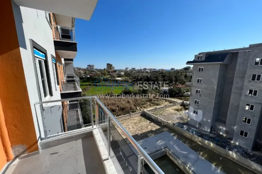 Приобрести Квартира 2+1 в Авсалларе с чистовой отделкой и видом на горы в современном комплексе 13