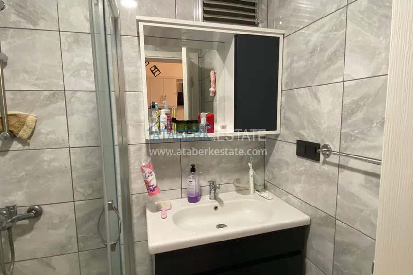 Приобрести Квартира 1+1 в Махмутларе меблированная с видом на горы и море. Мопед в подарок!  14 