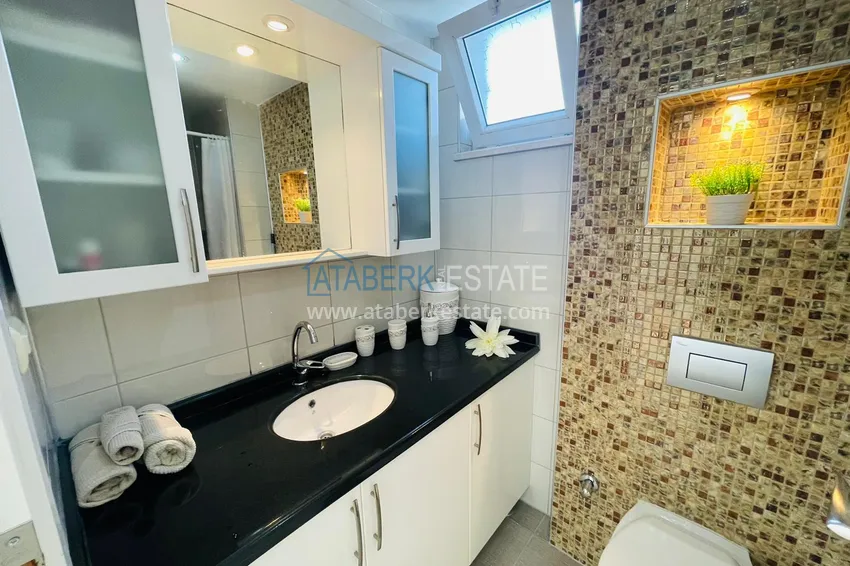 Приобрести Меблированная двухкомнатная квартира рядом с морем в Алании район Оба 15 