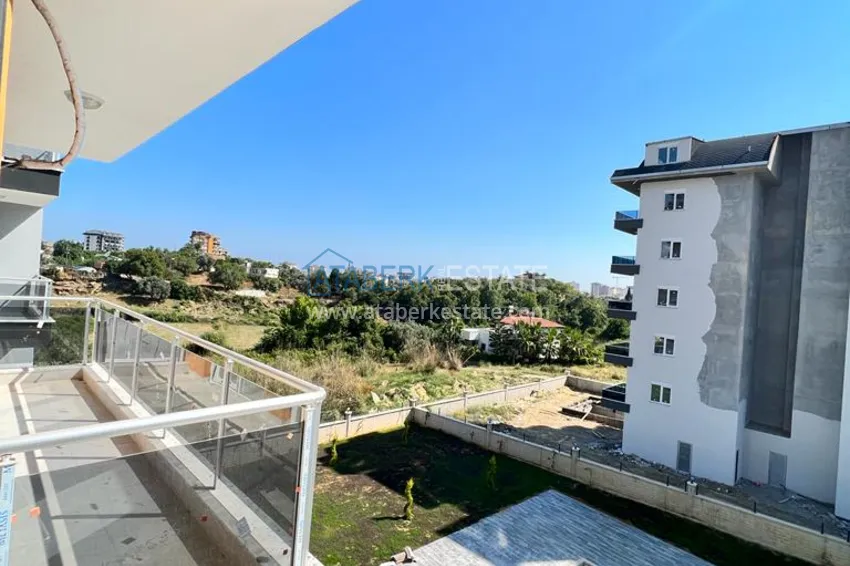 Приобрести Квартира 2+1 в Авсалларе с чистовой отделкой и видом на горы в современном комплексе 15