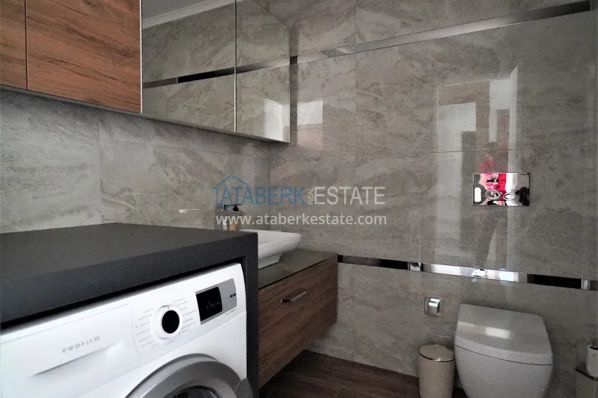 Приобрести Пентхаус – дуплекс в районе Оба, меблированный в молодом современном комплексе 18 