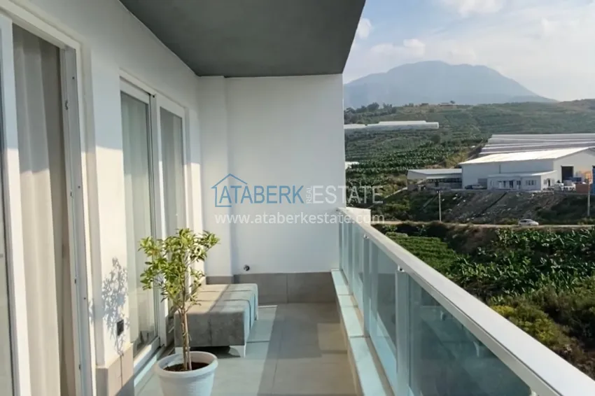 Приобрести Квартира 1+1 в Махмутларе меблированная с видом на горы и море. Мопед в подарок!  18 