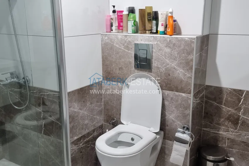 Приобрести Квартира 2+1 меблированная в комфортабельном жилом комплексе, район Джикджилли – Алания 10 