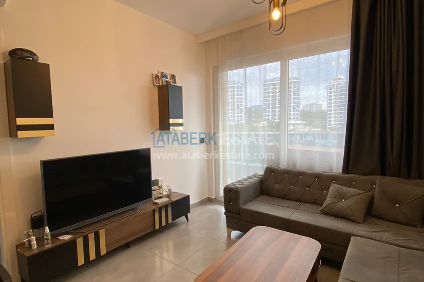 Приобрести Квартира 1+1 в Махмутларе меблированная с видом на горы и море. Мопед в подарок!  1 