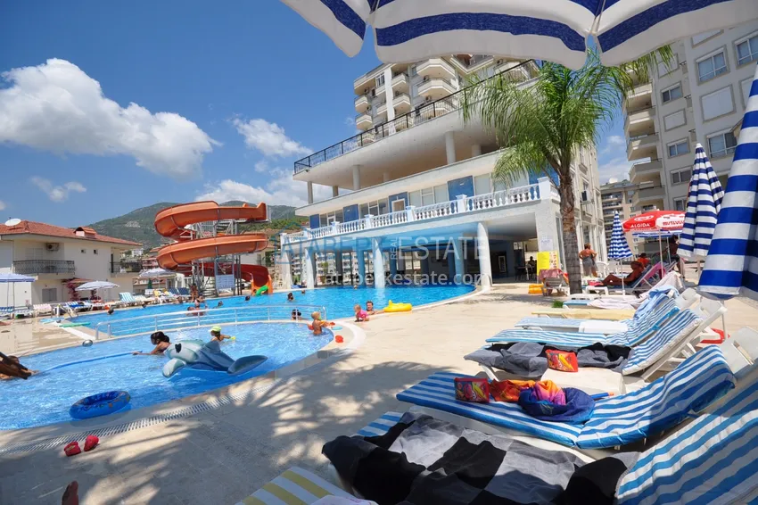 Квартира 2+1 с частичным видом на горы, район Джикджилли – Алания 1 