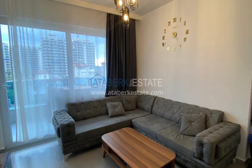 Приобрести Квартира 1+1 в Махмутларе меблированная с видом на горы и море. Мопед в подарок!  2 