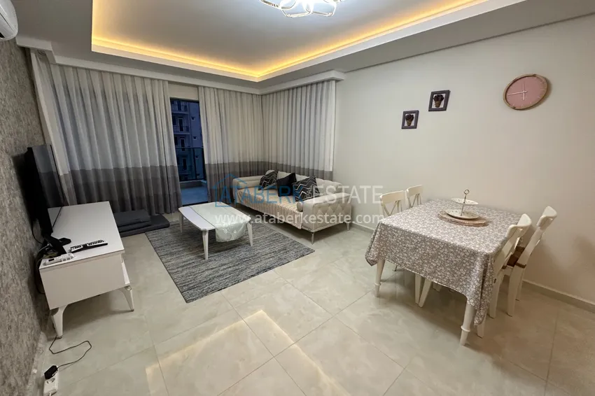 Приобрести Квартира 1+1 меблированная с открытым видом на море, район Махмутлар – Алания 2 