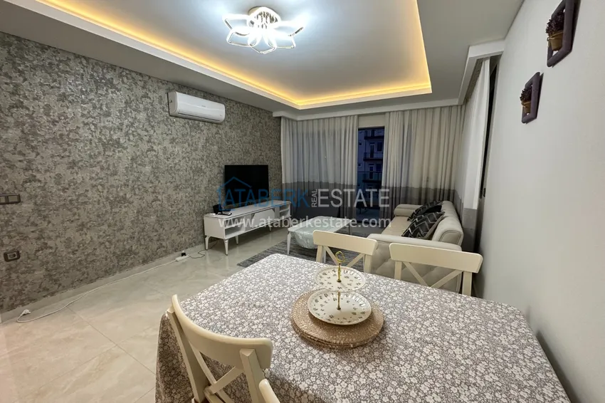 Приобрести Квартира 1+1 меблированная с открытым видом на море, район Махмутлар – Алания 3 