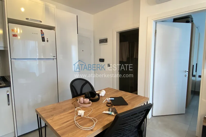 Приобрести Квартира 1+1 в Махмутларе меблированная с видом на горы и море. Мопед в подарок!  4 