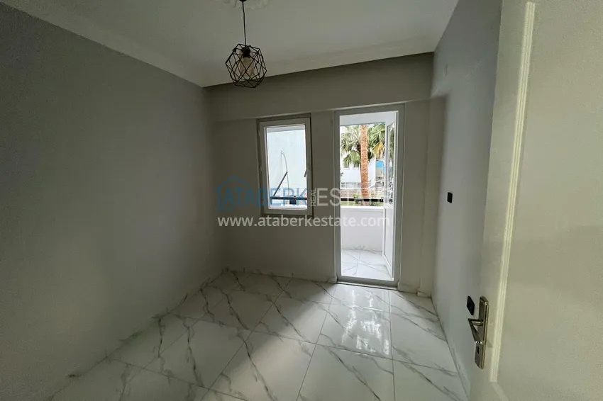 Приобрести Квартира у моря с двумя спальнями и отдельной кухней в районе Конаклы, Алания 4 