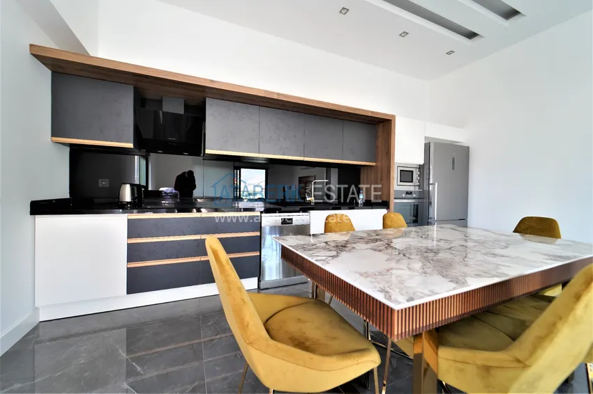 Приобрести Пентхаус – дуплекс в районе Оба, меблированный в молодом современном комплексе 5 