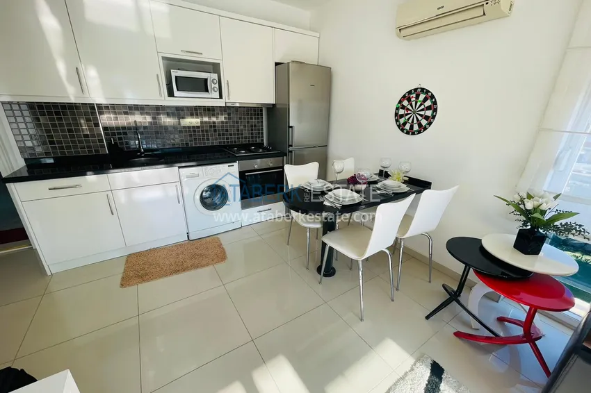 Приобрести Меблированная двухкомнатная квартира рядом с морем в Алании район Оба 6 