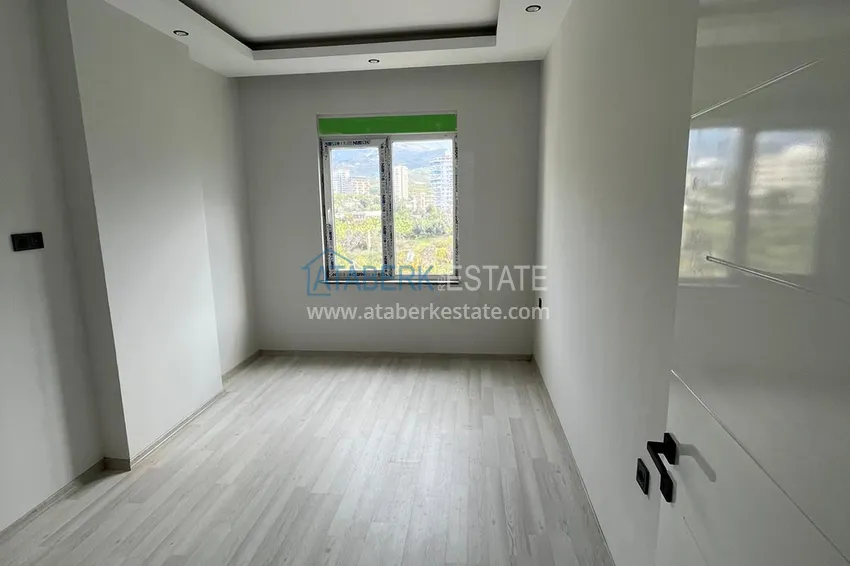 Приобрести Квартира 2+1 с чистовой отделкой в новом комплексе, Махмутлар - Алания 7 