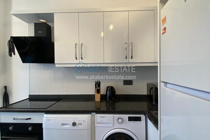 Приобрести Квартира 1+1 в Махмутларе меблированная с видом на горы и море. Мопед в подарок!  6 