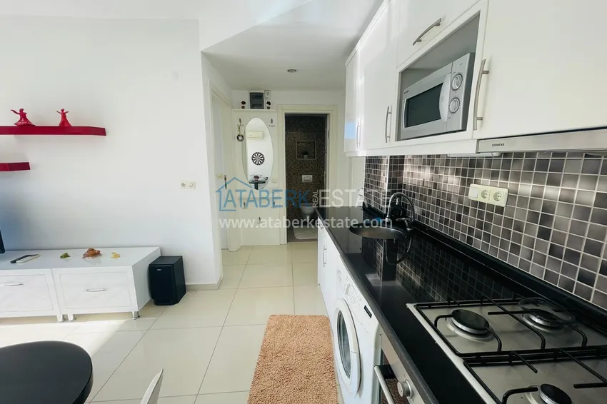 Приобрести Меблированная двухкомнатная квартира рядом с морем в Алании район Оба 7 