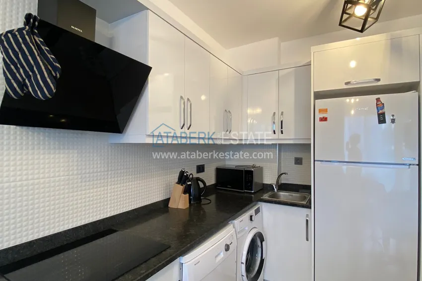 Приобрести Квартира 1+1 в Махмутларе меблированная с видом на горы и море. Мопед в подарок!  7 