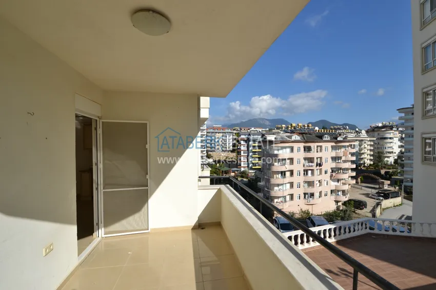 Приобрести Квартира 2+1 с частичным видом на горы, район Джикджилли – Алания 8 