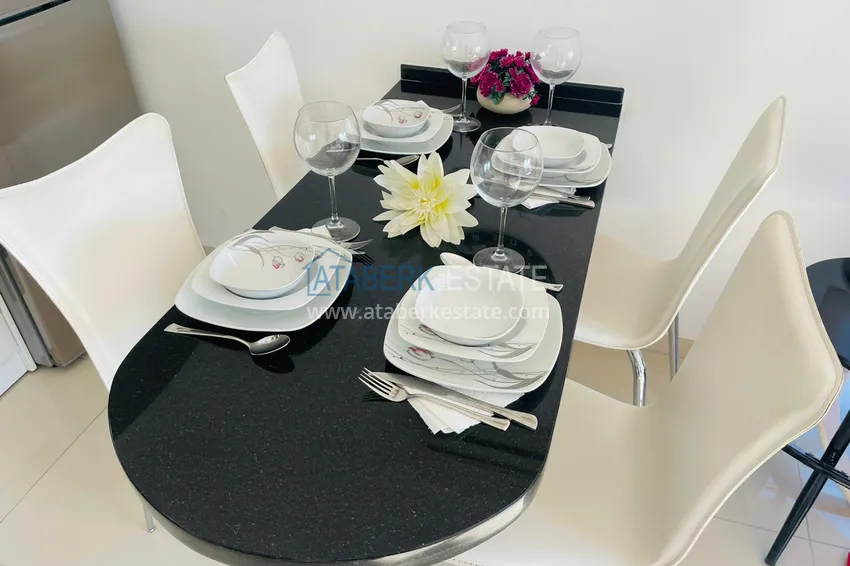 Приобрести Меблированная двухкомнатная квартира рядом с морем в Алании район Оба 8 