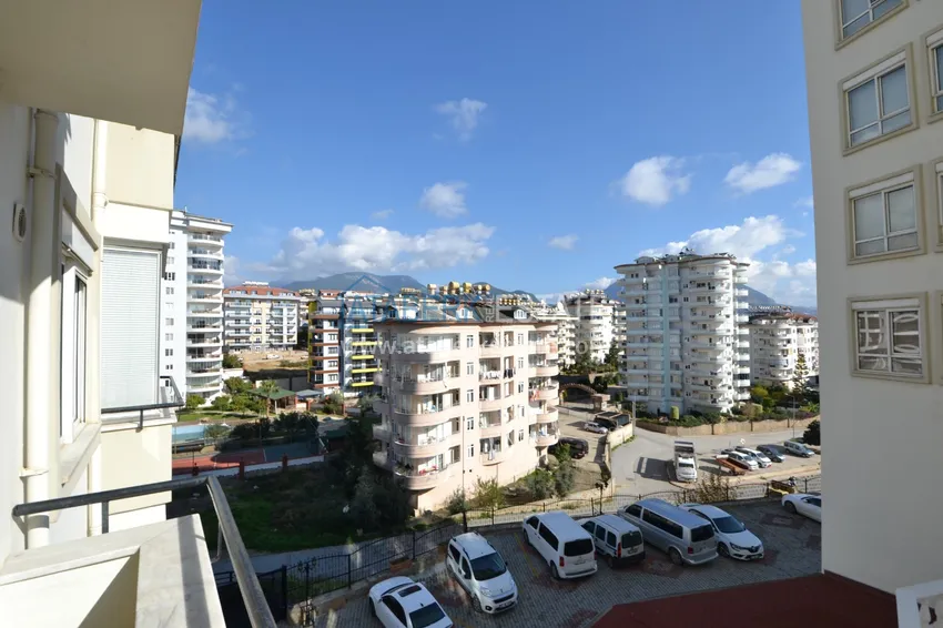 Приобрести Квартира 2+1 с частичным видом на горы, район Джикджилли – Алания 9 