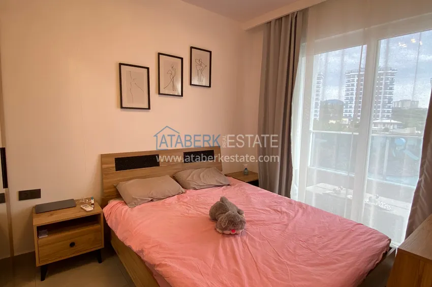 Приобрести Квартира 1+1 в Махмутларе меблированная с видом на горы и море. Мопед в подарок!  8 