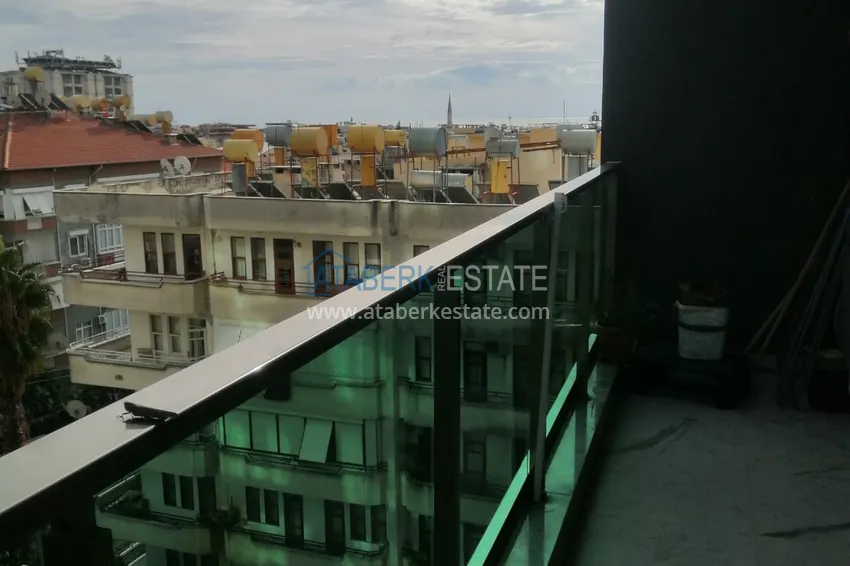 Приобрести Квартира 2+1 в центре Алании с мебелью и видом на море в комплексе с инфраструктурой 8 