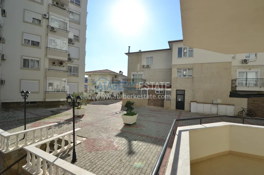 Приобрести Квартира 2+1 с частичным видом на горы, район Джикджилли – Алания 11 